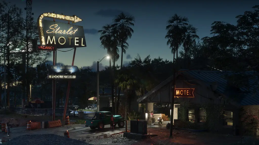 Neon motel sign and palms at night in Port Gellhorn