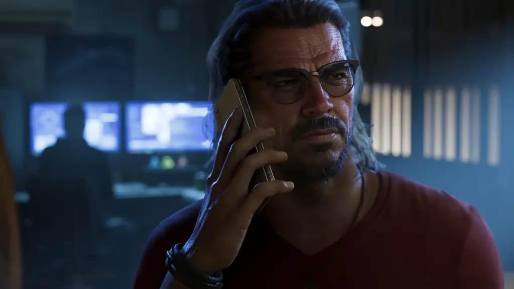 Raul Bautista on a phone call in a dim room