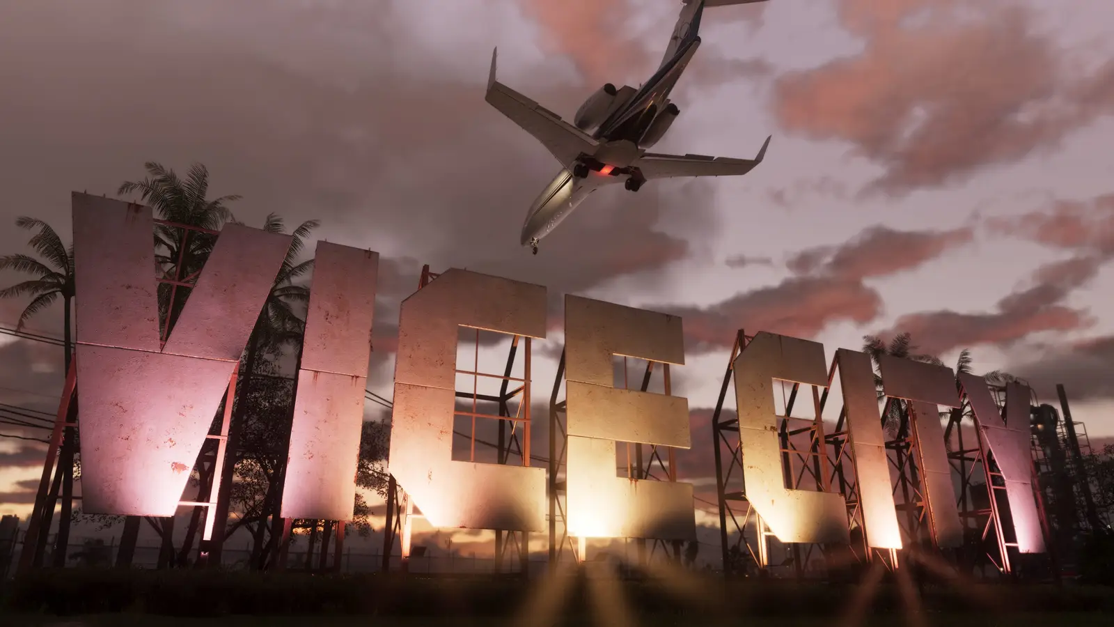 A giant Vice City sign at dusk with a jet flying overhead